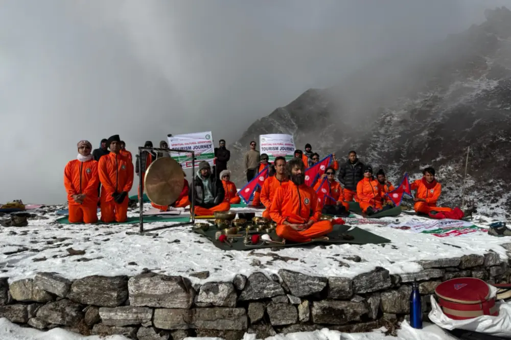 The Foundation's 2024 Gosaikunda camp — participants seated in snow around a gong and singing bowls with cloud and mountain behind